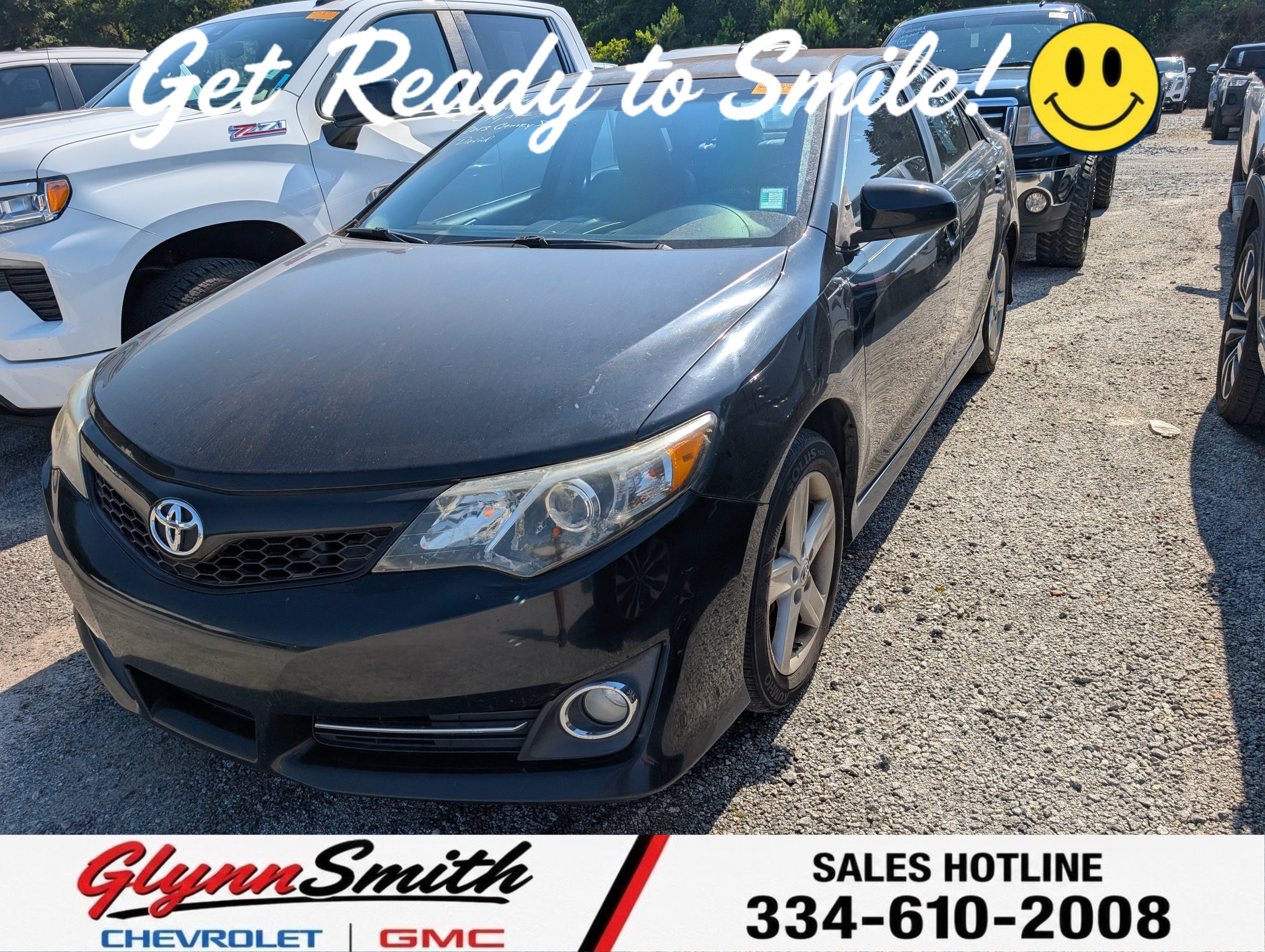 2013 Toyota Camry L in Attitude Black Metallic — front three-quarter view